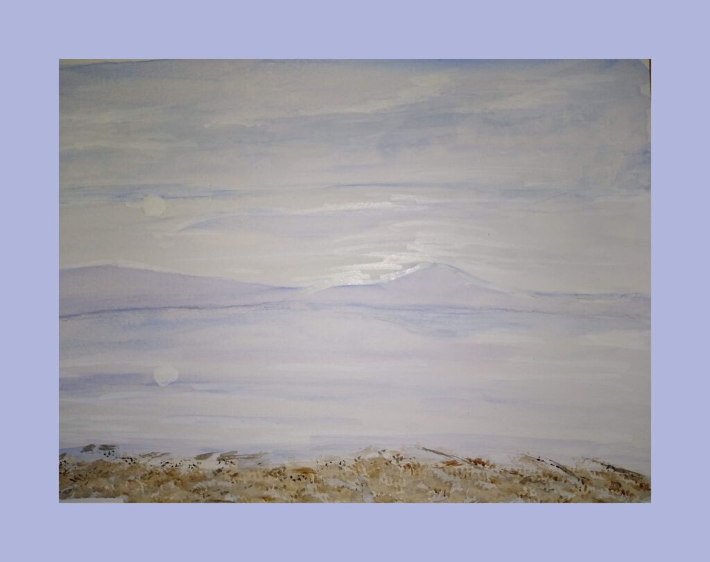 sea scene with mountains across the bay