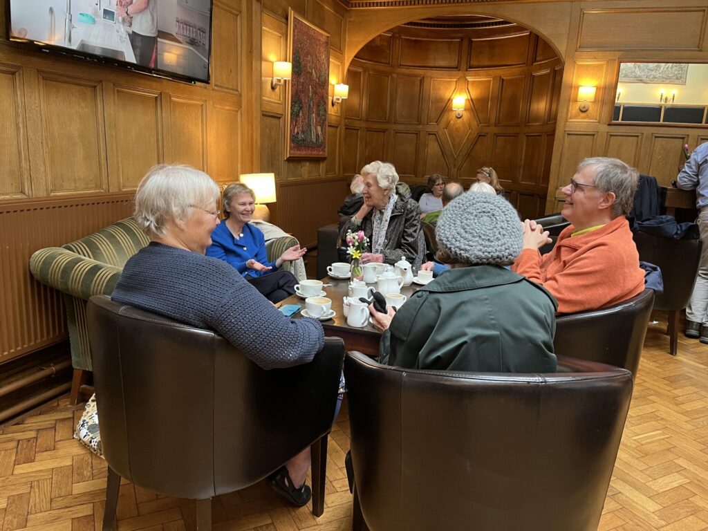 members enjouing coffee
